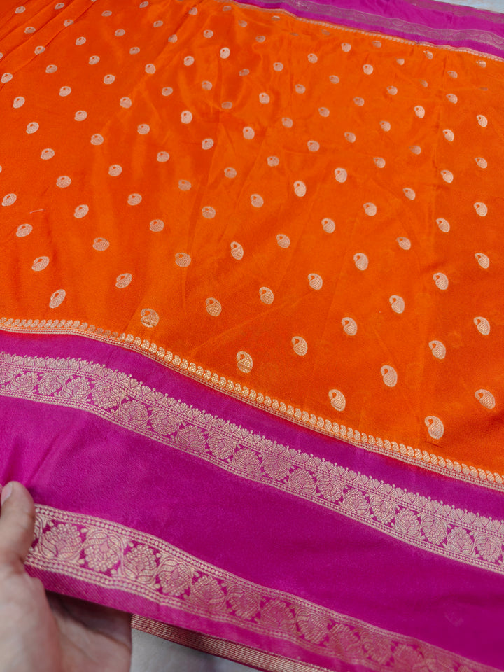 KHADDI GEORGETTE IN ORANGE WITH RANI BORDER