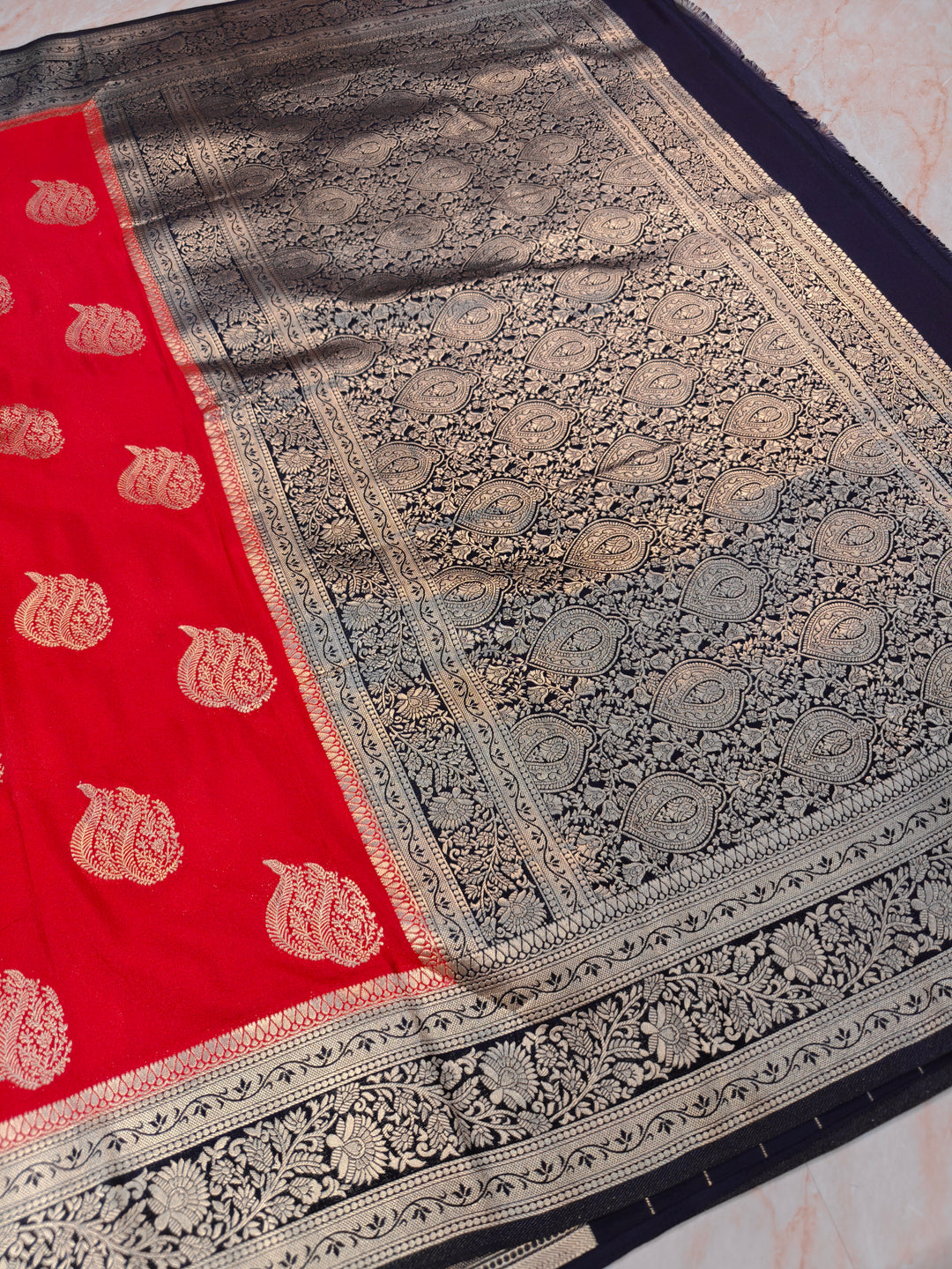 KHADDI GEORGETTE IN RED WITH CHARCOAL BLACK BORDER