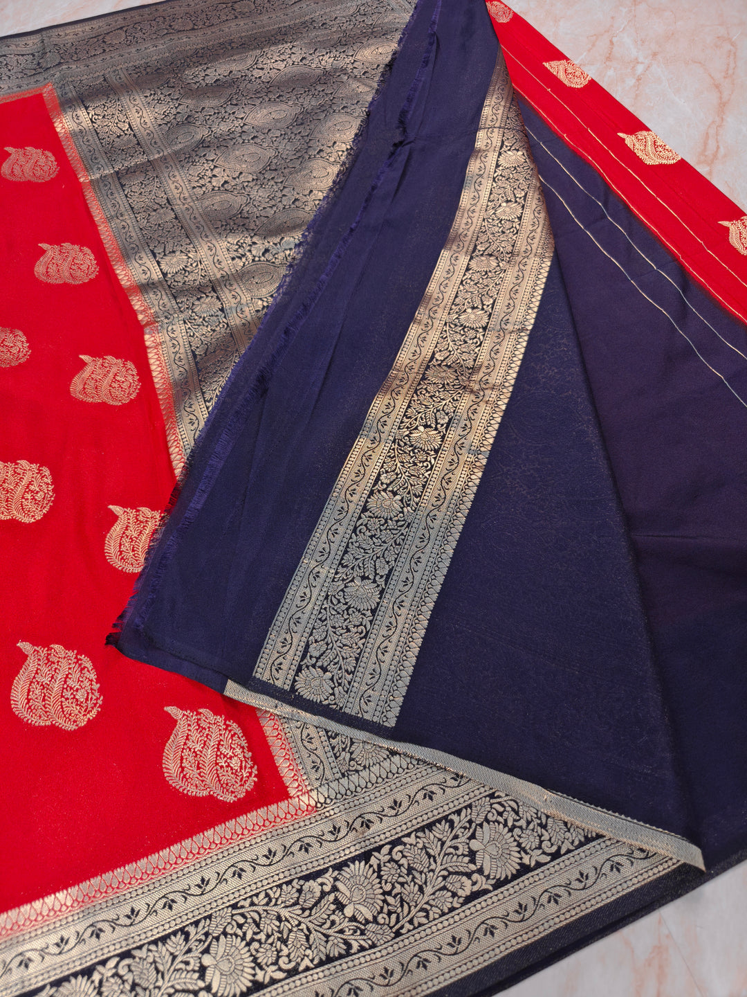 KHADDI GEORGETTE IN RED WITH CHARCOAL BLACK BORDER