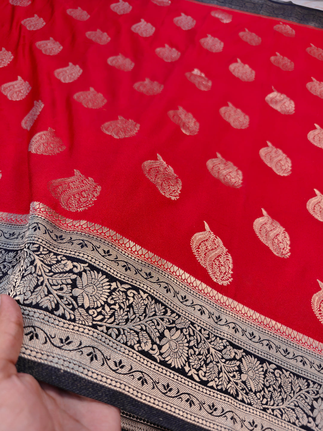 KHADDI GEORGETTE IN RED WITH CHARCOAL BLACK BORDER