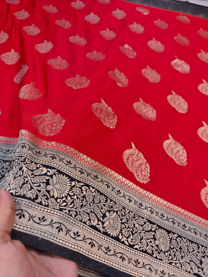 KHADDI GEORGETTE IN RED WITH CHARCOAL BLACK BORDER