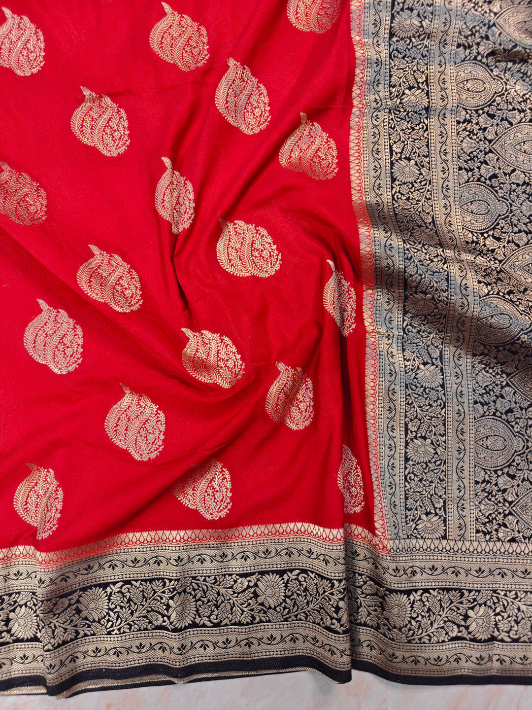 KHADDI GEORGETTE IN RED WITH CHARCOAL BLACK BORDER