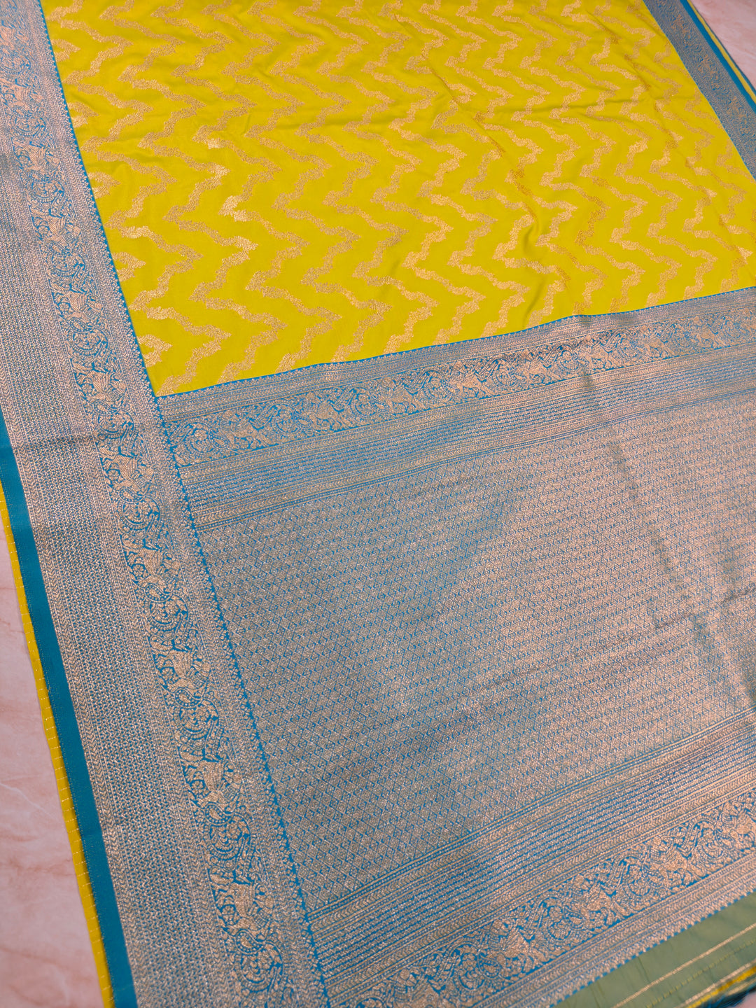 BANARASI KATAN SILK IN GOLD WITH SKY BLUE BORDER