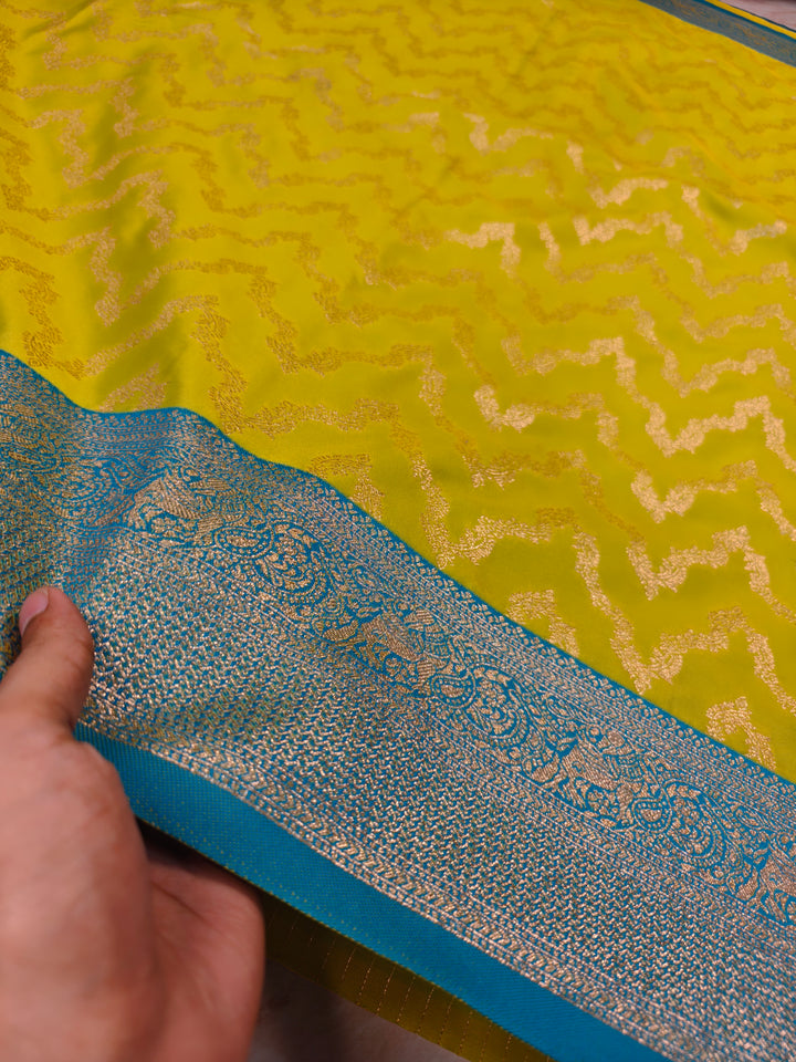 BANARASI KATAN SILK IN GOLD WITH SKY BLUE BORDER