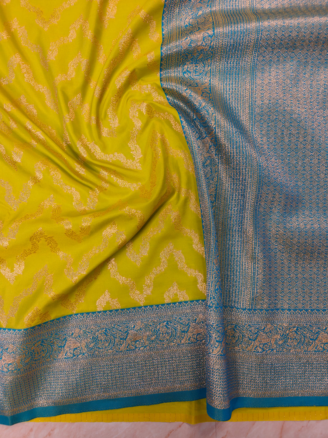 BANARASI KATAN SILK IN GOLD WITH SKY BLUE BORDER