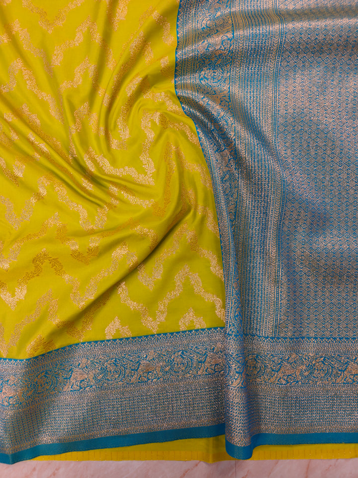 BANARASI KATAN SILK IN GOLD WITH SKY BLUE BORDER