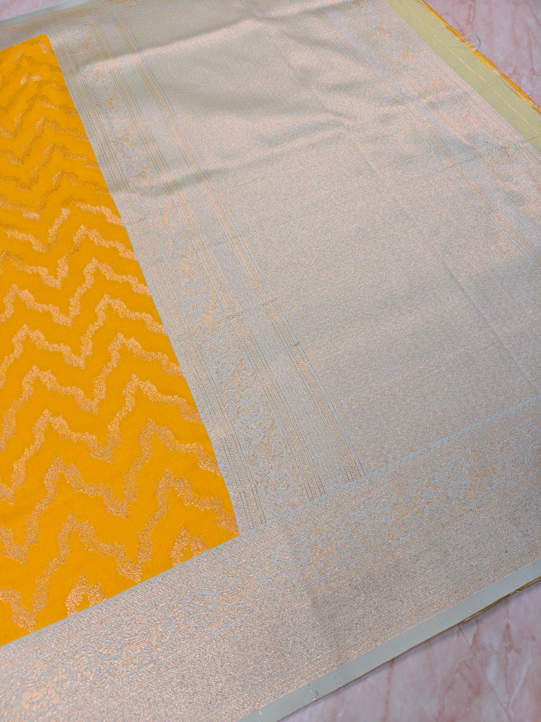 BANARASI KATAN SILK IN AIRY GOLD WITH LIGHT BLUE BORDER