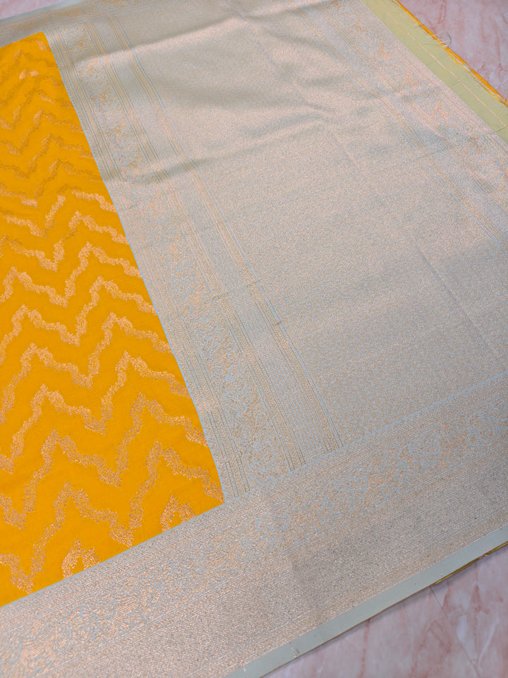 BANARASI KATAN SILK IN AIRY GOLD WITH LIGHT BLUE BORDER