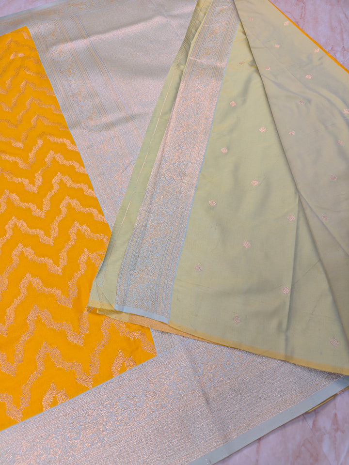 BANARASI KATAN SILK IN AIRY GOLD WITH LIGHT BLUE BORDER