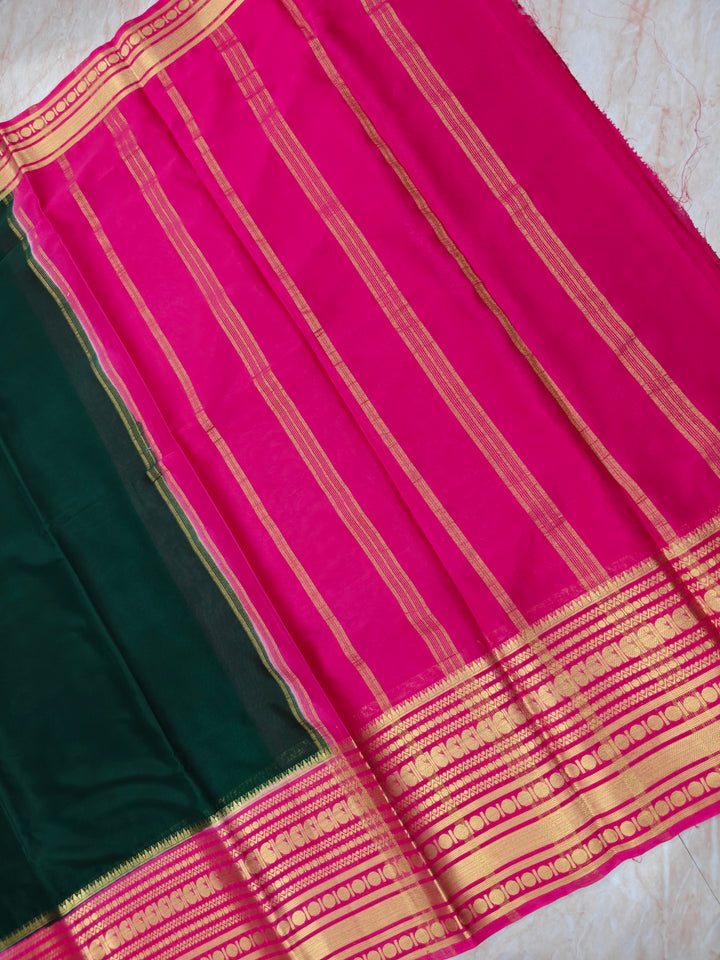 CREPE GEORGETTE IN BOTTLE GREEN WITH RANI BORDER