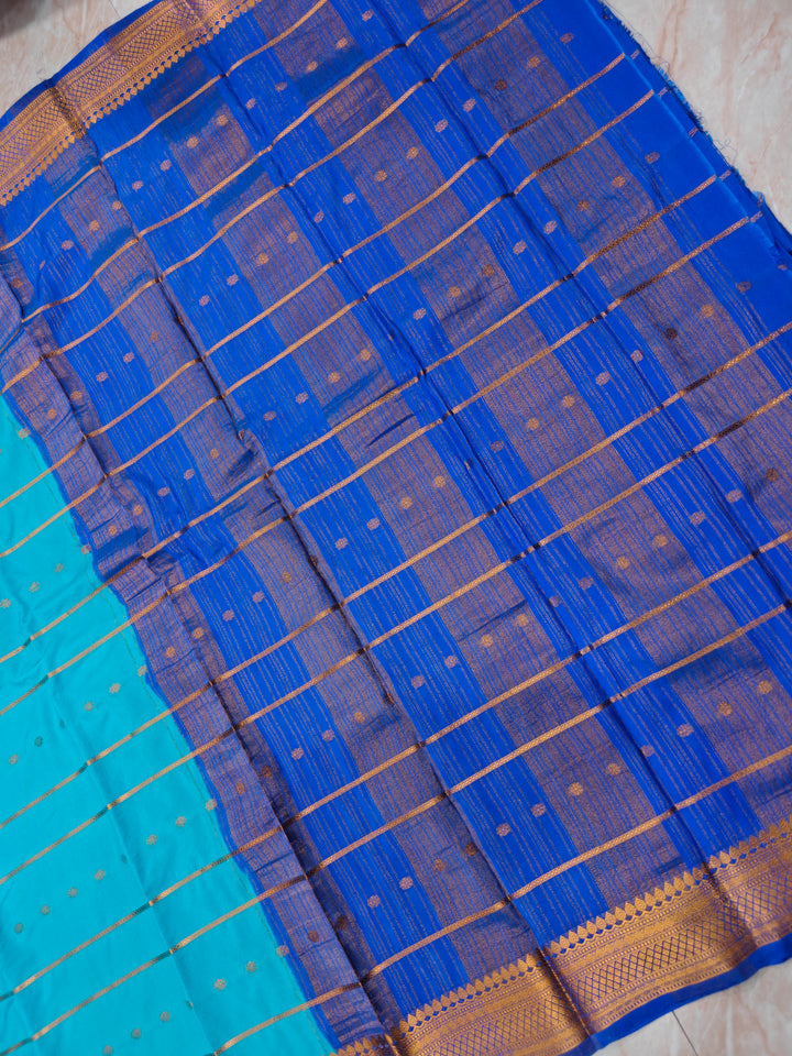 CREPE GEROGETTE IN CORAL BLUE WITH ROYAL BLUE BORDER