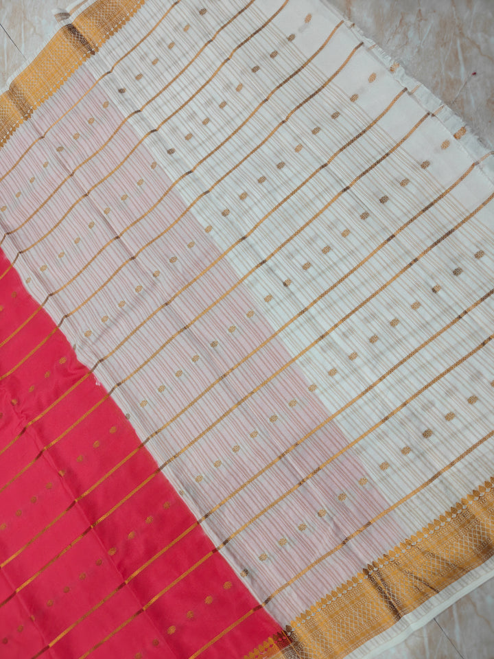 CREPE GEORGETTE IN PEACH WITH CREAM BORDER