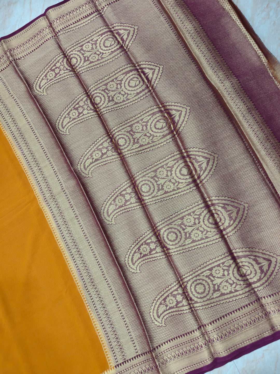 CREPE GEORGETTE IN MUSTARD ORANGE WITH  WINE BORDER