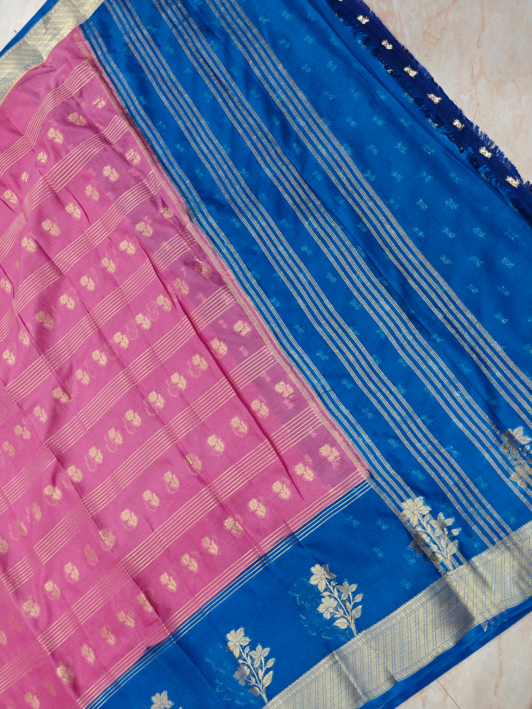 CREPE GEORGETTE IN BABY PINK WIYH ROYAL BLUE BORDER