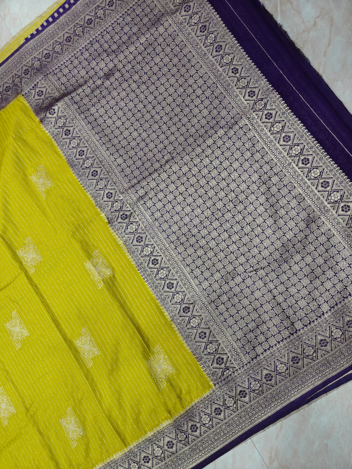 GEORGETTE SAREE IN GOLD WITH  PURPLE BORDER