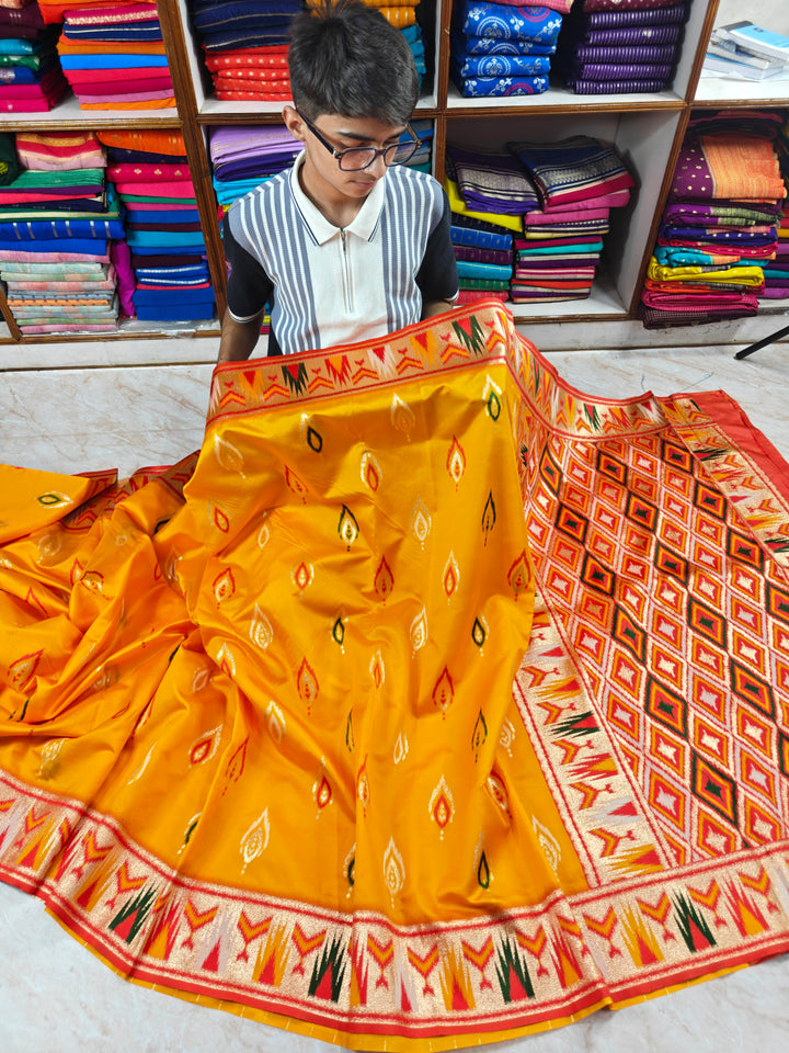 BANARASI KATAN SOFT SILK IN MANGO COLOUR WITH IKKAT STYLE