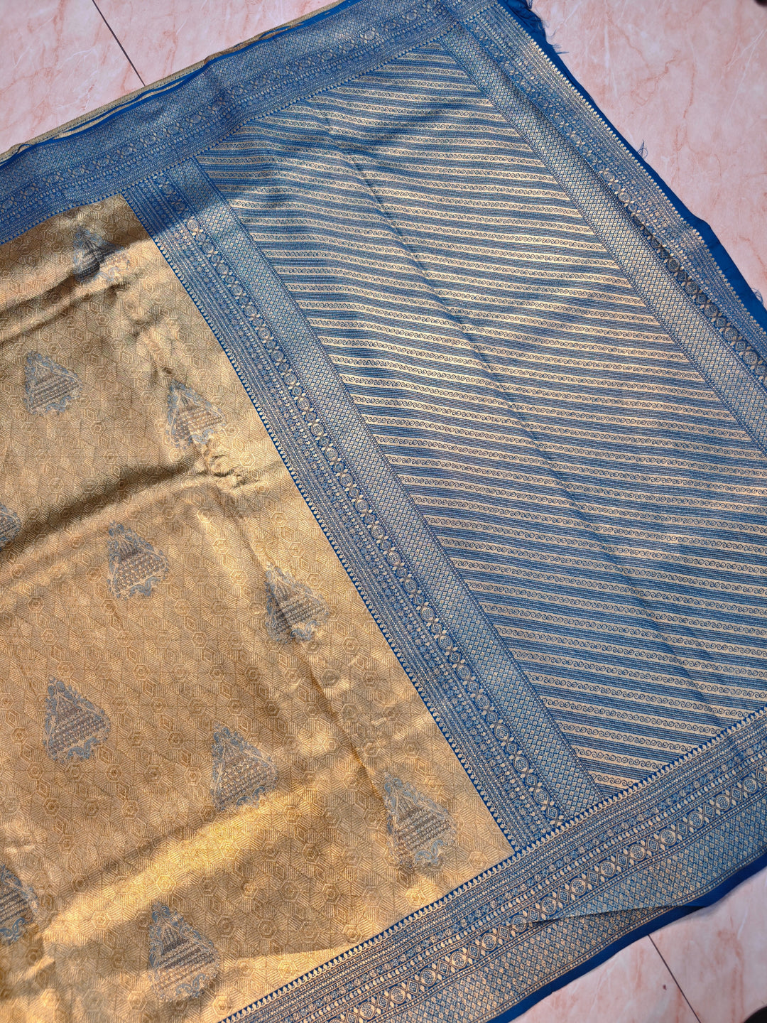 DHARMAVARAM ALFI IN GOLD WITH MEENA BOOTA AND BLUE BORDER