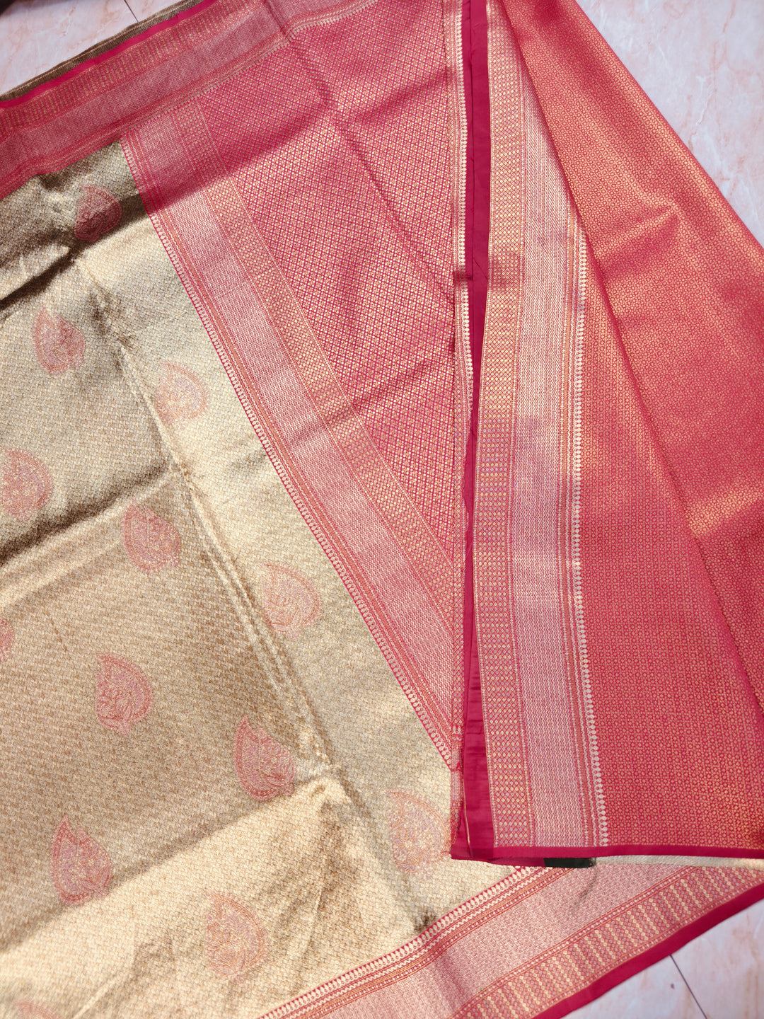 DHARMAVARAM TISU IN GOLD WITH RED BORDER