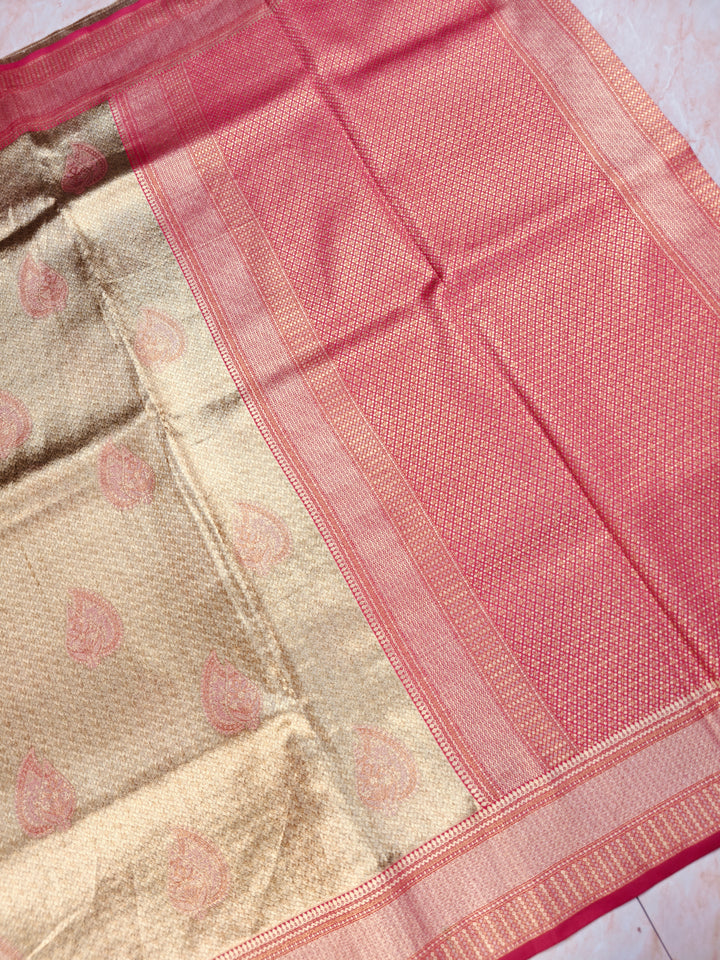 DHARMAVARAM TISU IN GOLD WITH RED BORDER