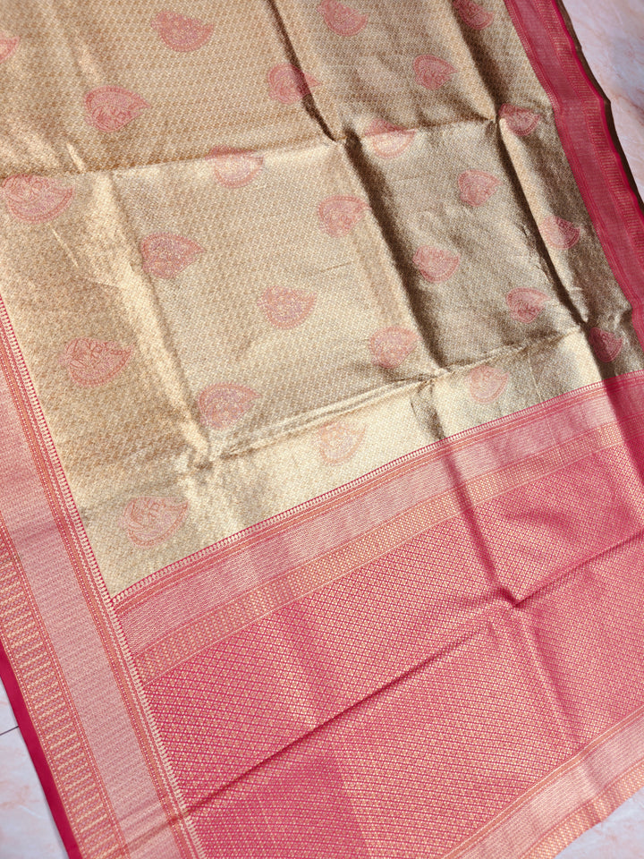 DHARMAVARAM TISU IN GOLD WITH RED BORDER