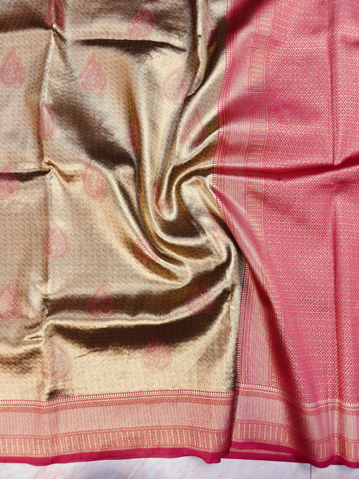 DHARMAVARAM TISU IN GOLD WITH RED BORDER