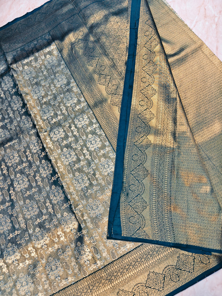 DHARMAVARAM TISU ALFI IN BOTTLE GREEN WITH INTRICATE ZARI WORK
