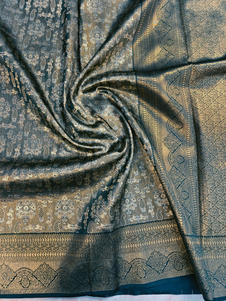 DHARMAVARAM TISU ALFI IN BOTTLE GREEN WITH INTRICATE ZARI WORK