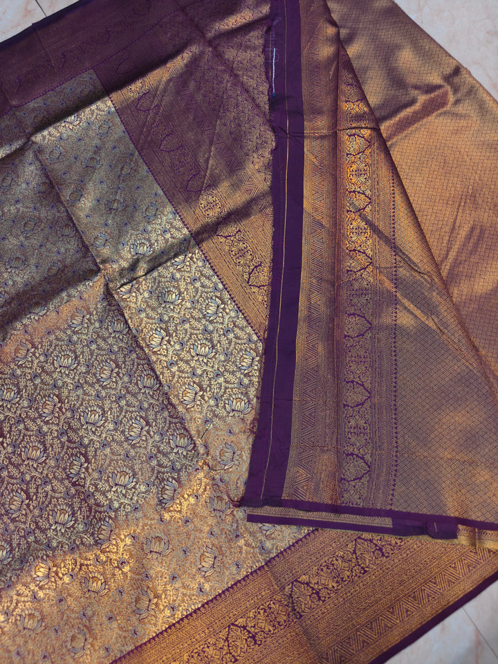 DHARMAVARAM TISU IN SILVER AND  GOLD WITH MAGENTA BORDER