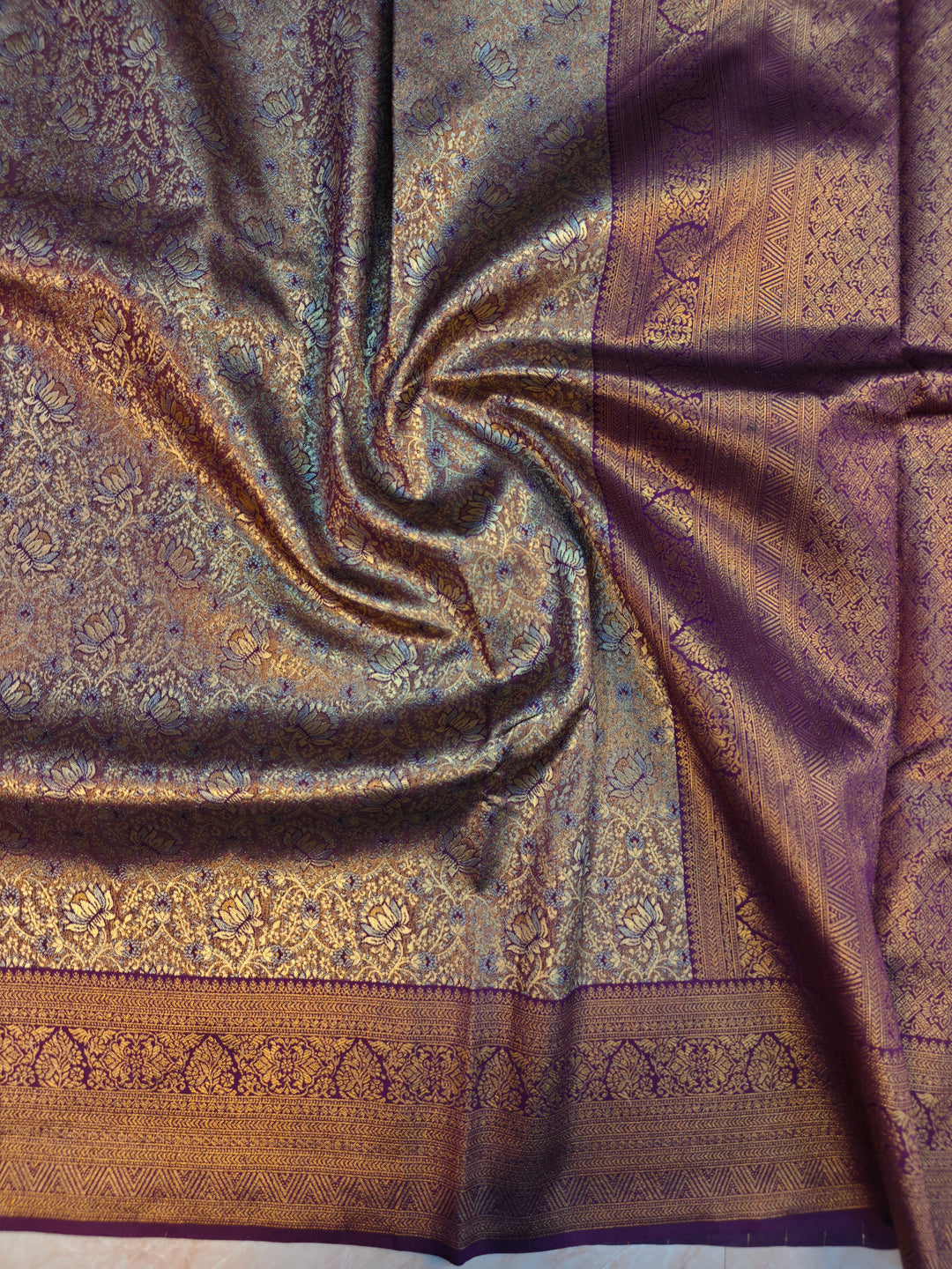 DHARMAVARAM TISU IN SILVER AND  GOLD WITH MAGENTA BORDER