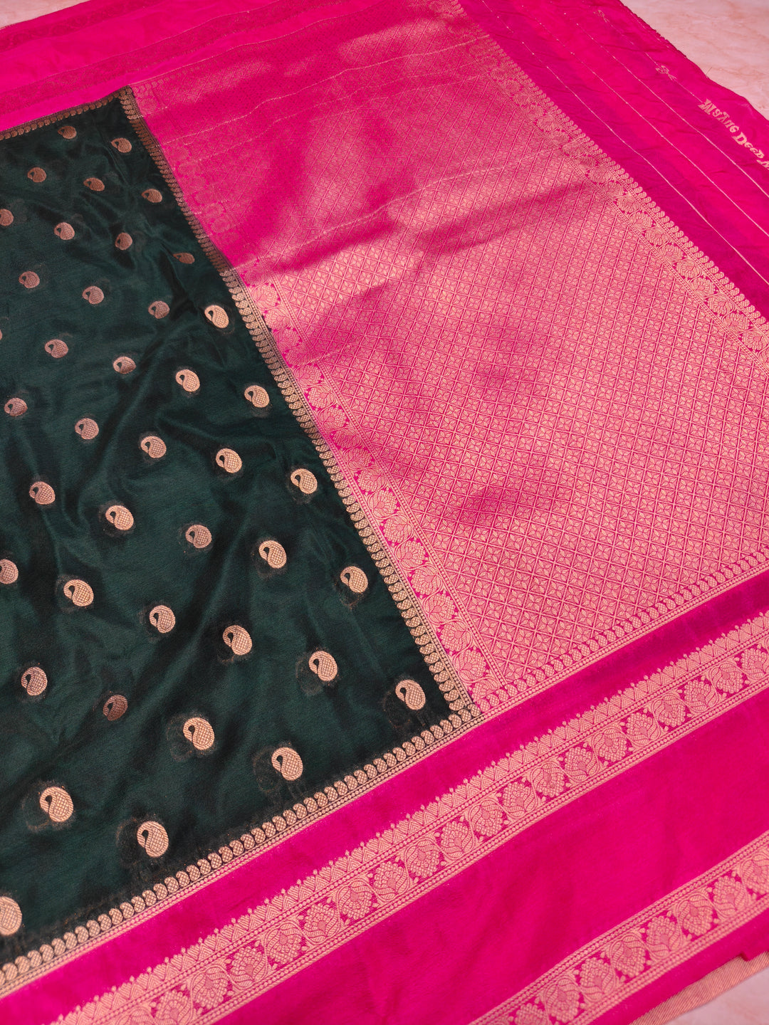 KHADDI GEROGETTE IN BOTTLE GREEN WITH RANI BORDER