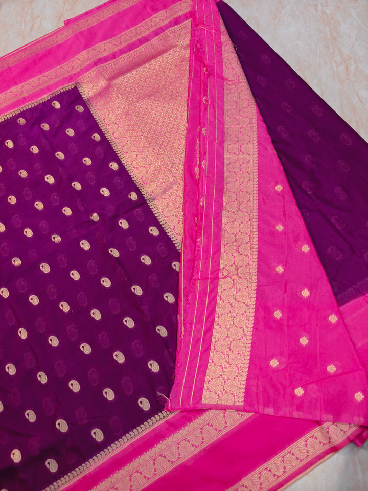 KHADDI GEORGETTE IN MAGENTA WITHBABY PINK BORDER