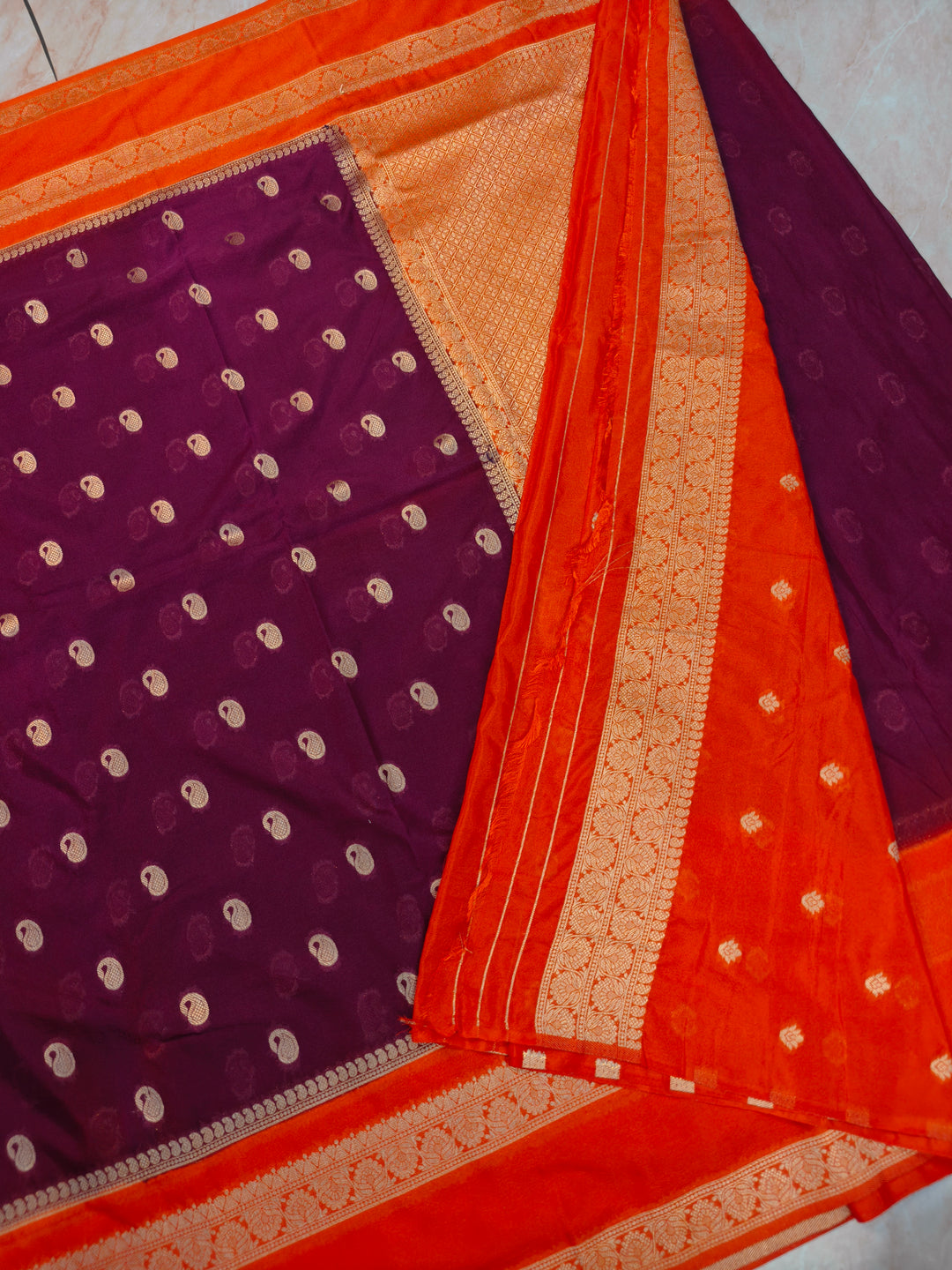 SEMI KHADDI GEORGETTE IN VINE WITH ORANGE BORDER