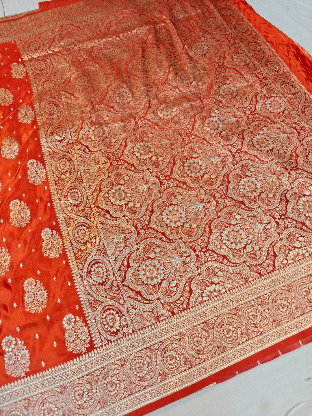 MASHRU KATAN SILK IN ORANGE WITH GOLD ZARI WORK BOOTA