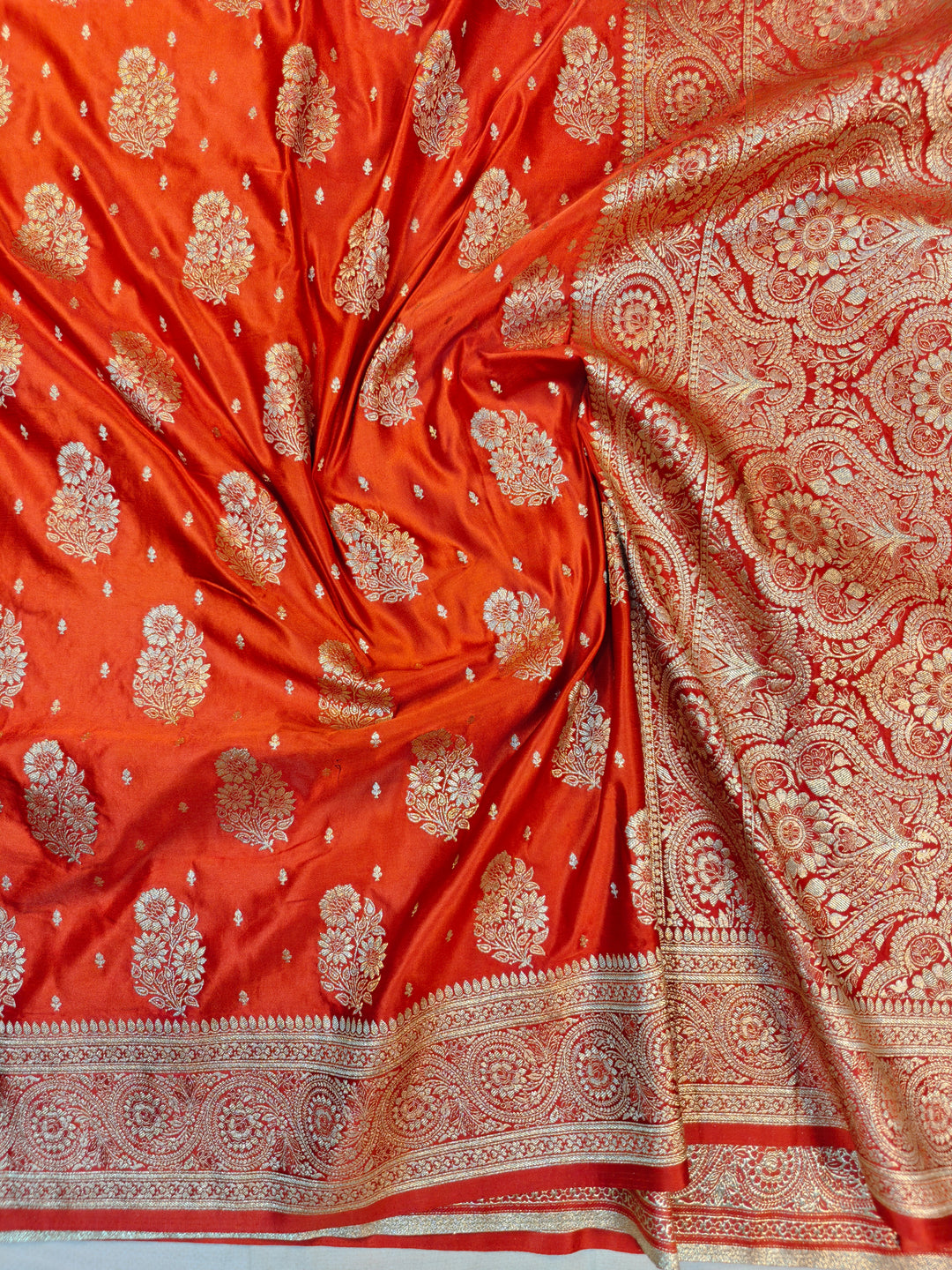MASHRU KATAN SILK IN ORANGE WITH GOLD ZARI WORK BOOTA