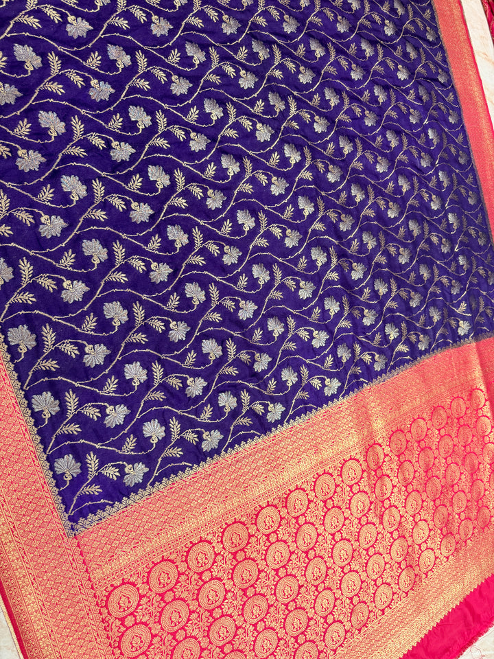 SEMI KHADDI GEORGETTE WITH ZARI MINA WEAVE IN PURPLE WITH CHERRY RED BORDER