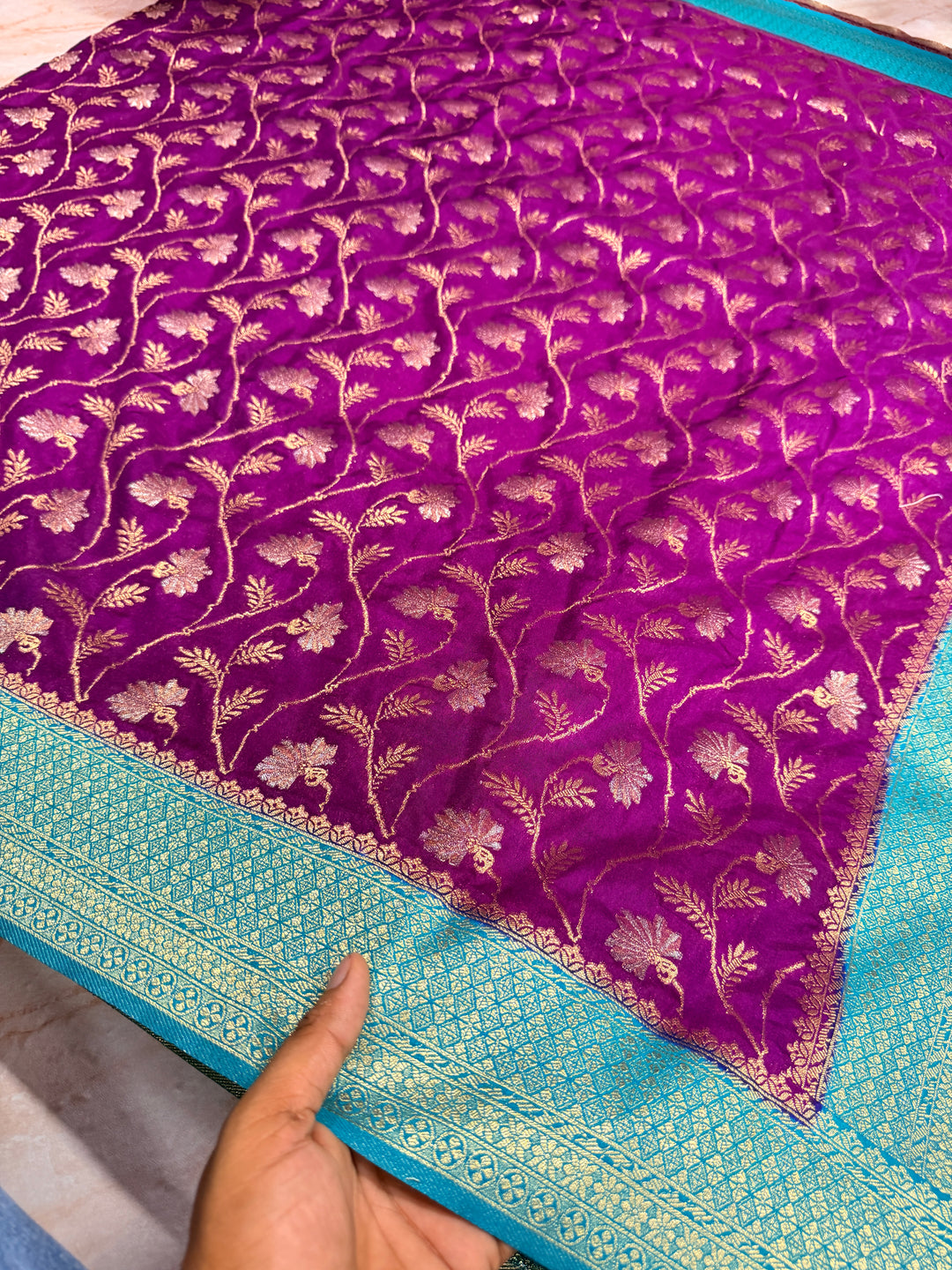 SEMI KHADDI GEORGETTE WITH ZARI MINA WEAVE IN MAGENTA WITH RAMA GREEN BORDER