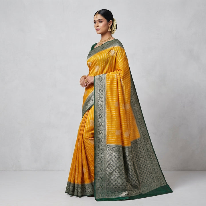 KHADDI GEORGETTE IN MUSTARD GOLD WITH BOTTLE GREEN BORDER