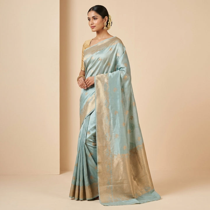 RUSSIAN SILK IN SEA GREENWITH FLORAL BOOTI SAREE