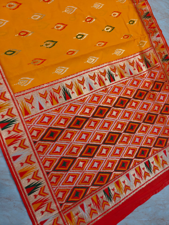 BANARASI KATAN SOFT SILK IN MANGO COLOUR WITH IKKAT STYLE