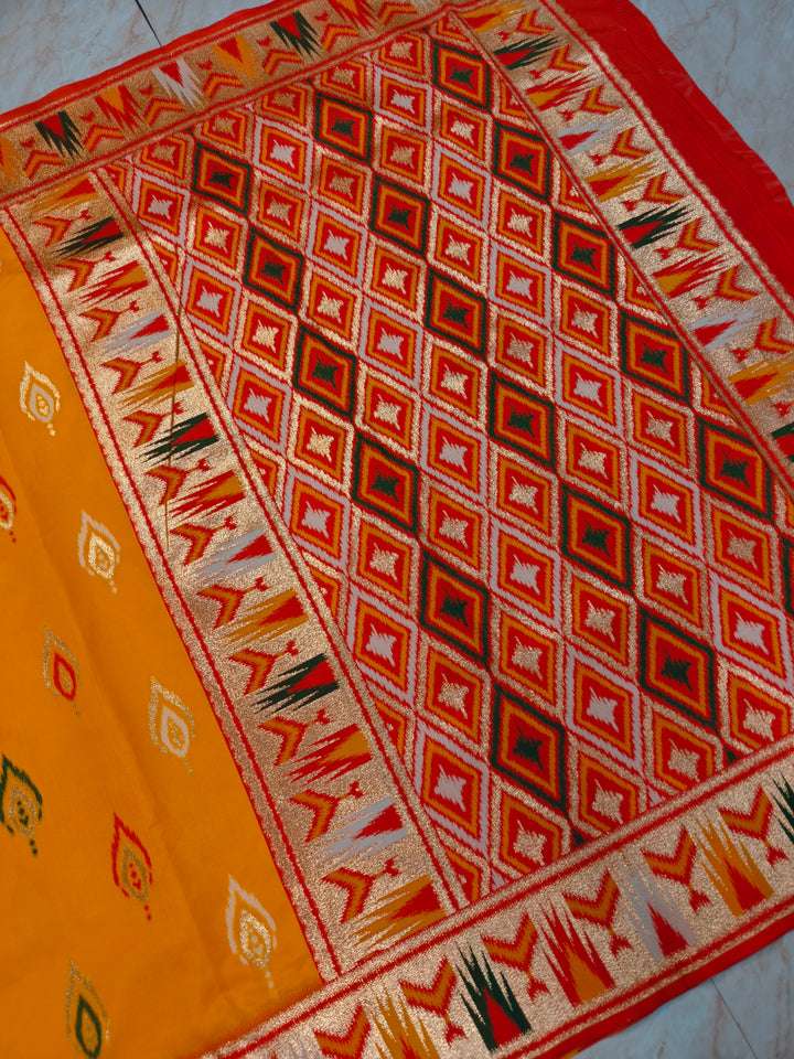 BANARASI KATAN SOFT SILK IN MANGO COLOUR WITH IKKAT STYLE