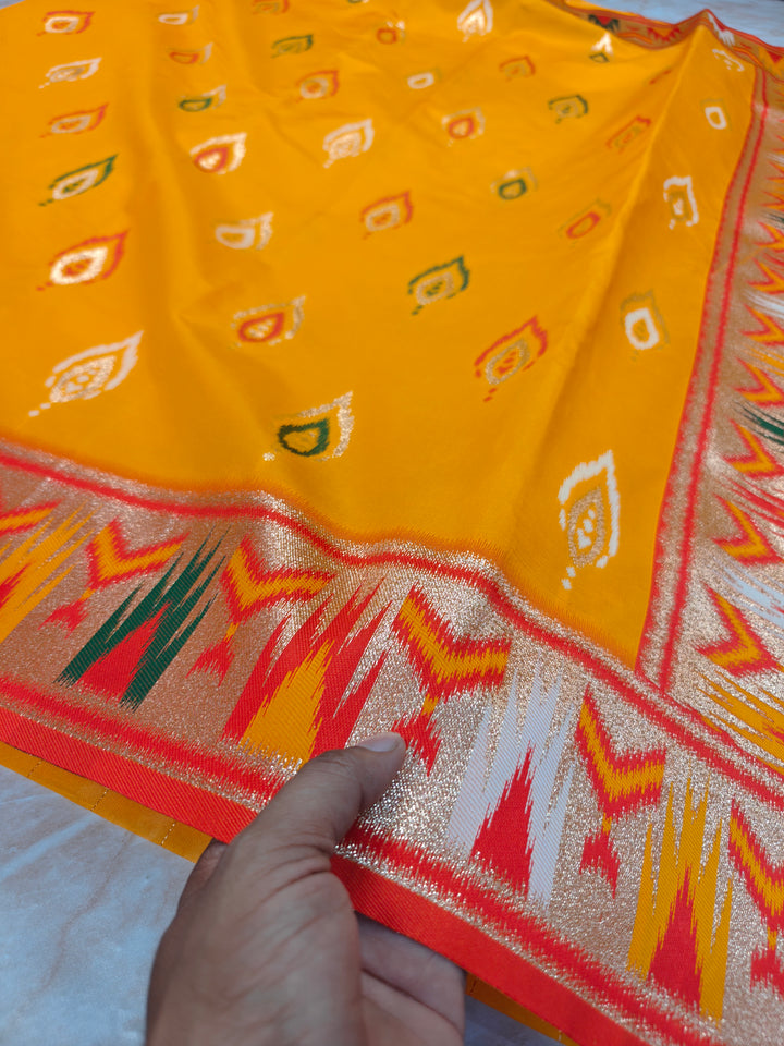 BANARASI KATAN SOFT SILK IN MANGO COLOUR WITH IKKAT STYLE