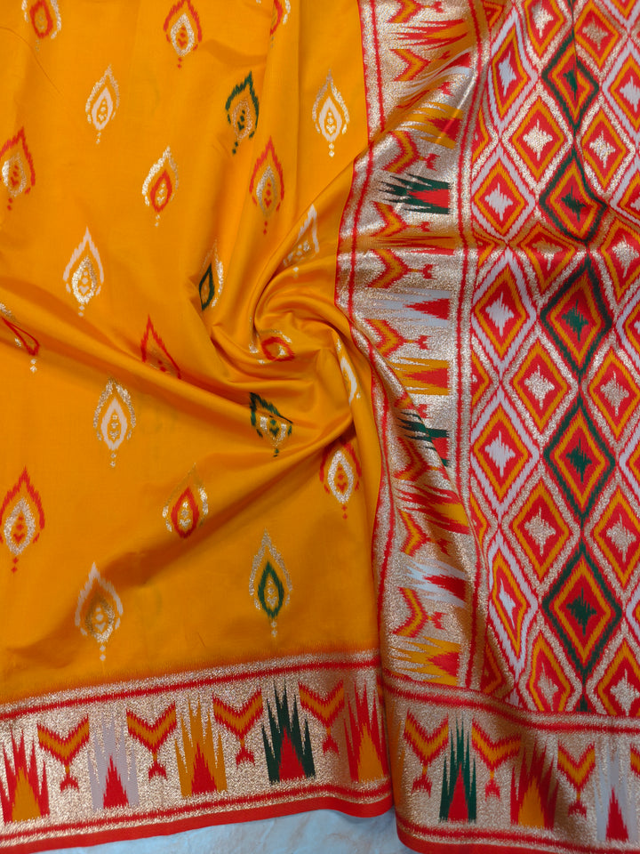 BANARASI KATAN SOFT SILK IN MANGO COLOUR WITH IKKAT STYLE