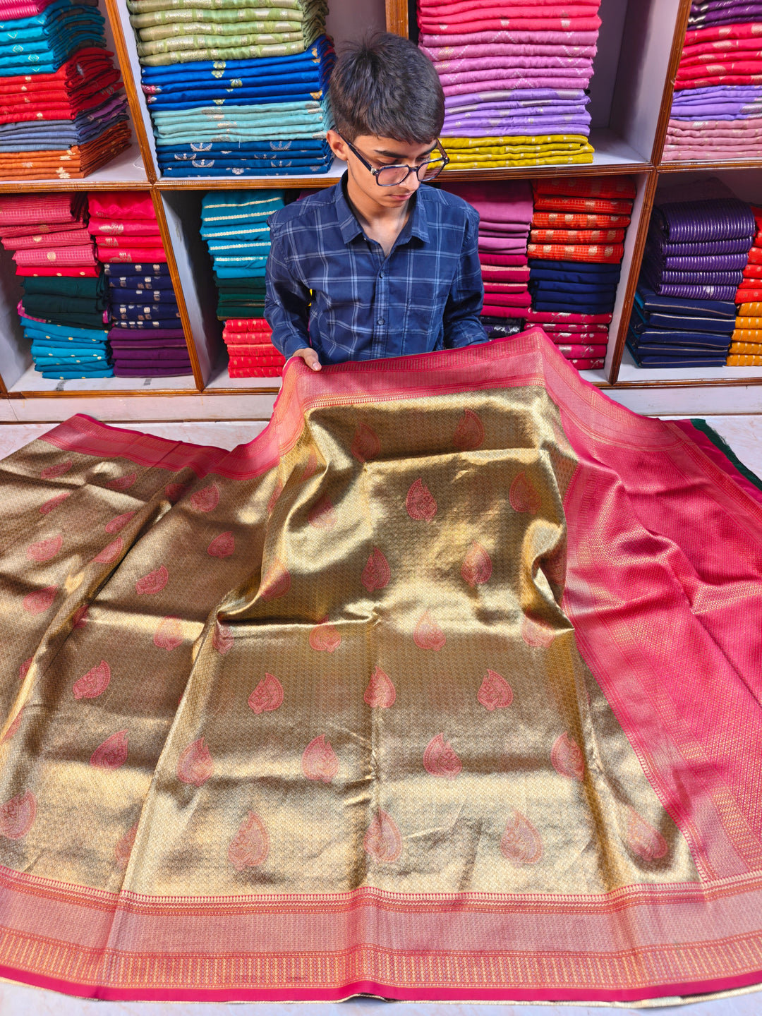 DHARMAVARAM TISU IN GOLD WITH RED BORDER