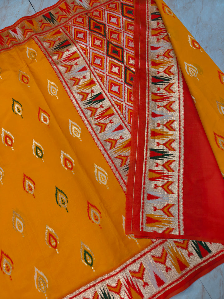 BANARASI KATAN SOFT SILK IN MANGO COLOUR WITH IKKAT STYLE